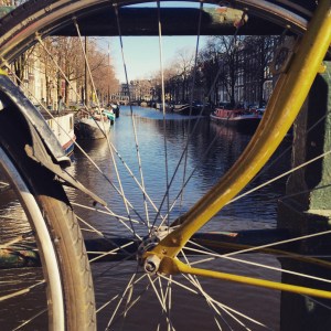 Bikes, bridges and houseboats in Amsterdam.